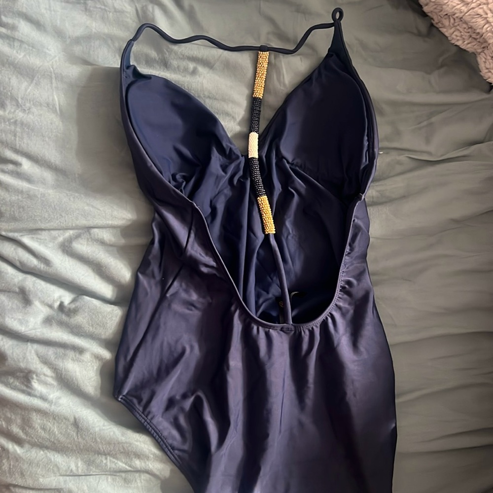 Brand new never worn one piece luxury swimsuit